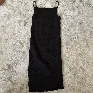 Black ruffle body con dress